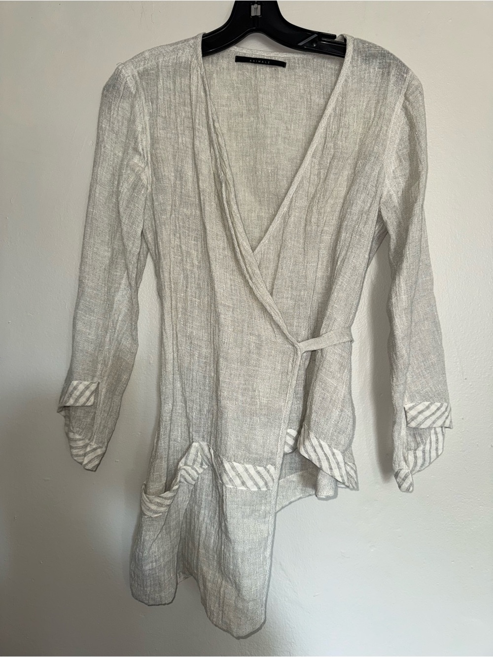 Animale Black Label on Light Gray Textured Fabric